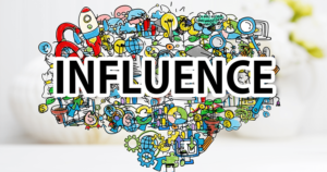 sticker bomb with the word influence over the top